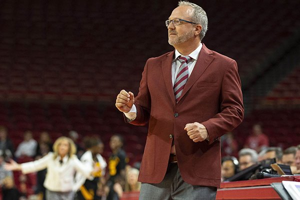 Arkansas coach Mike Neighbors watches during a game against Arizona State on Sunday, Nov. 18, 2018, in Fayetteville. 