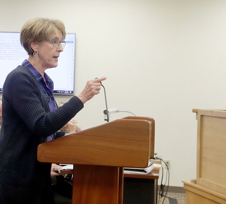 LYNN KUTTER ENTERPRISE-LEADER Barbara O'Brien of Farmington addresses Farmington Planning Commission about rezoning land on Double Springs Road to a higher density zone classification. The Commission voted 4-3 to approve the rezoning request.