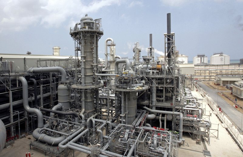 This April 4, 2009, file photo, shows a gas production facility at Ras Laffan, Qatar. The tiny, energy-rich Arab nation of Qatar announced on Monday, Dec. 3, 2018 it would withdraw from OPEC, mixing its aspirations to increase production outside of the cartel's constraints with the politics of slighting the Saudi-dominated group amid the kingdom's boycott of Doha. 