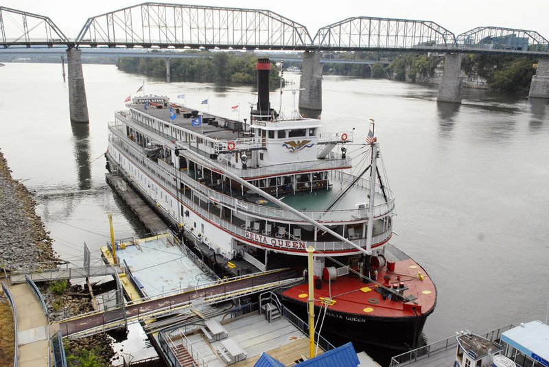 FILE - In this Sept. 25, 2013, file photo, the Delta Queen riverboat is moored at Coolidge Park on in downtown Chattanooga, Tenn. President Donald Trump signed legislation on Tuesday, Nov. 4, 2018, that will allow the historic 1920s Delta Queen to cruise the nation's rivers once again after a 10-year layoff. (John Rawlston/Chattanooga Times Free Press via AP, File)