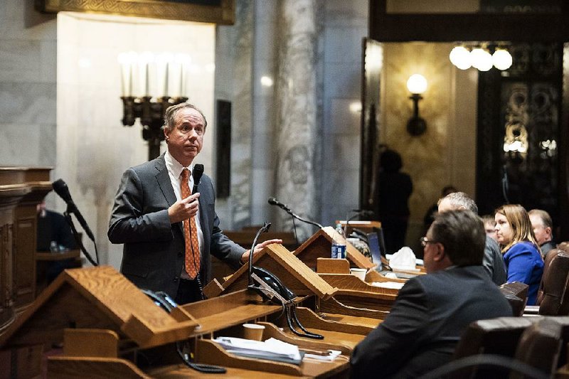 Robin Vos, the Republican speaker of the Wisconsin state assembly, addresses lawmakers Wednesday at the Capitol in Madison, during debate over a series of bills that would weaken the incoming Democratic governor’s authority. 