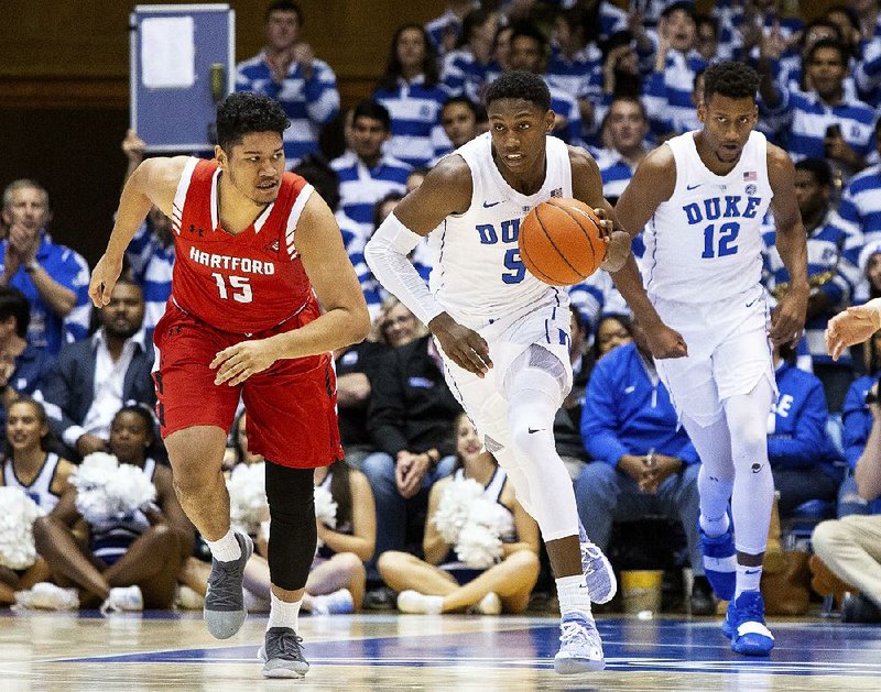 Freshman RJ Barrett (right) scored 27 points and grabbed a season-high 15 rebounds Wednesday to lead No. 3 Duke to an 84-54 victory over Hartford in Durham, N.C.