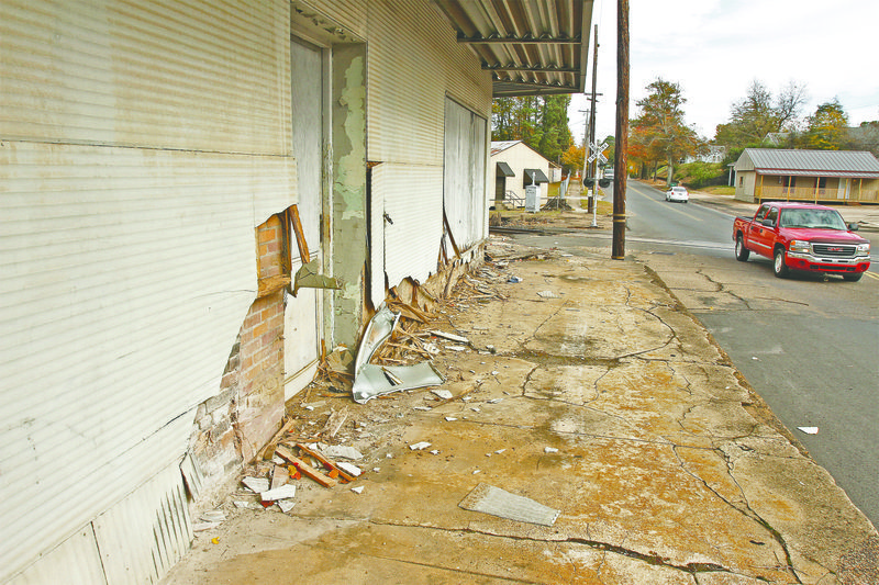 El Dorado car dealer worker stole BMW, crashed into local newspaper