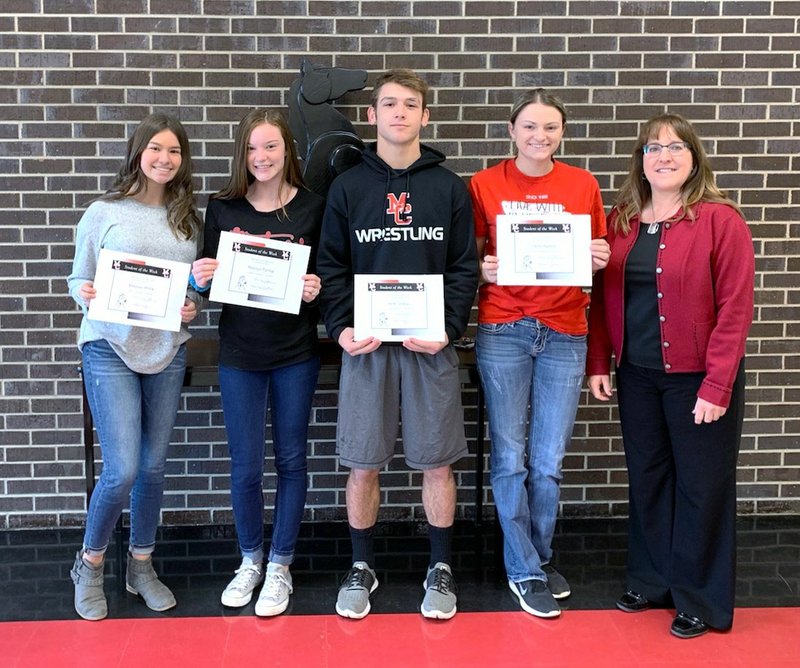 Photo Submitted MCHS Students for the week of Nov. 5 to Nov. 9 shown above are (from left) freshman Shaylen Willis, sophomore Katelyn Ferdig, junior Jack Teague and senior Callie Keaton with Mrs. Holloway.