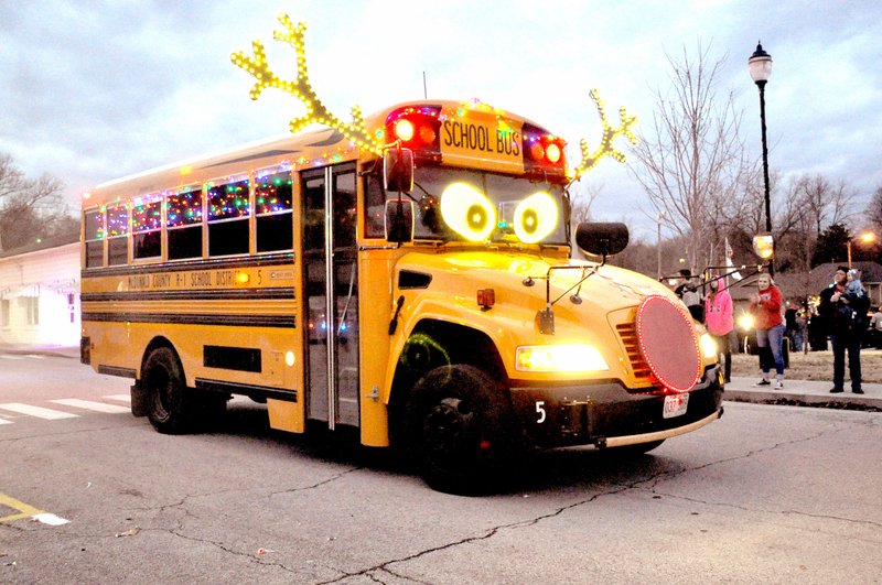 RACHEL DICKERSON/MCDONALD COUNTY PRESS McDonald County Transportation won best overall for its reindeer bus in the Pineville Christmas parade on Saturday.