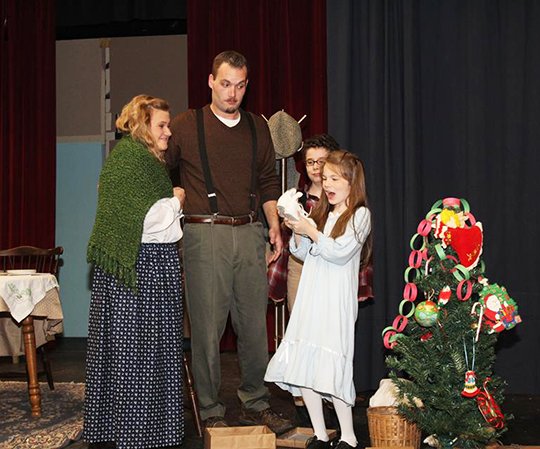 Submitted Photo CHRISTMAS SURPRISE: Actors from the Pocket Theatre's production of "Yes, Virginia, there is a Santa Claus" act out a scene from the play. The performances conclude this weekend with shows on Friday and Saturday at 7:30 p.m. and a matinee on Sunday at 2:30.