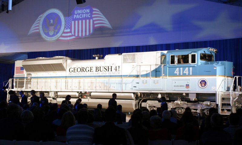 FILE - In this Oct. 18, 2005, file photo, a new locomotive numbered 4141 in honor of the 41st president, George H.W. Bush, is unveiled at Texas A&amp;M University in College Station, Texas. The locomotive unveiled for the special exhibit at George H.W. Bush's presidential library will be used to pull the late president's funeral train. The 4,300-horsepower machine will carry Bush's remains Thursday, Dec. 6, 2018, to his final resting place at his presidential library. (AP Photo/Pat Sullivan, File)