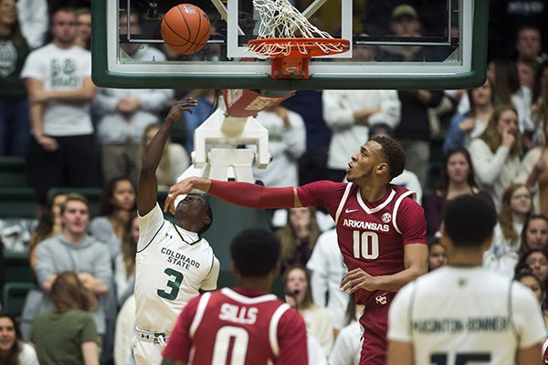 Colorado State guard Kendle Moore (3) makes a shot past Arkansas forward Daniel Gafford (10) during an NCAA college basketball game, Wednesday, Dec. 5, 2018, in Fort Collins, Colo. (Timothy Hurst/The Coloradoan via AP)

