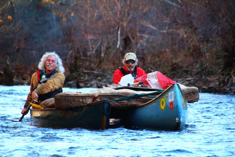 Bob Tyler (left) and Roger Head feel good about the trophy mattress they pulled from Cadron Creek during an Arkansas Canoe Club Black Ops Advanced Trash Removal outing Nov. 24.  (Special to the Democrat-Gazette/BOB ROBINSON)