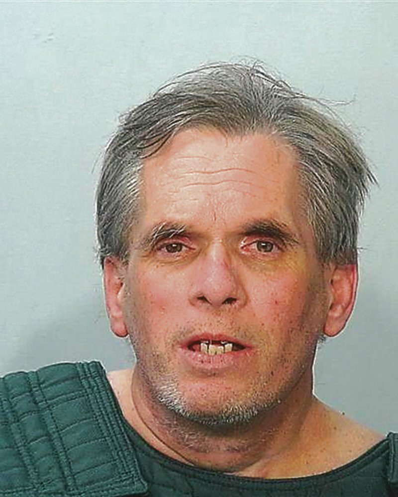 This booking photo released by the Fort Wayne, Ind., Police Department shows John D. Miller, who was arrested Sunday, July 15, 2018. Miller pleaded guilty Friday Dec. 7, 2018, to murder and child molestation charges in long-unsolved killing of April Tinsley. A plea agreement calls for Miller to serve 80 years in prison. (Fort Wayne Police/The Journal-Gazette via AP)