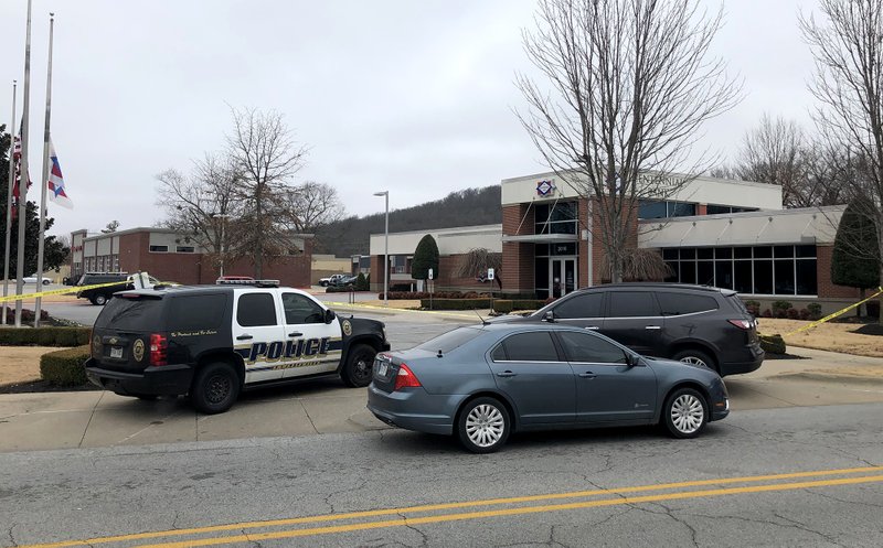 Fayetteville Police at the Centennial Bank on Martin Luther King Jr. Boulevard in Fayetteville investigating a bank robbery. 