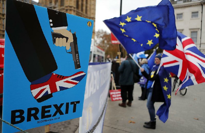 People protesting Britain’s exit from the European Union gather earlier this week outside Parliament in London. 