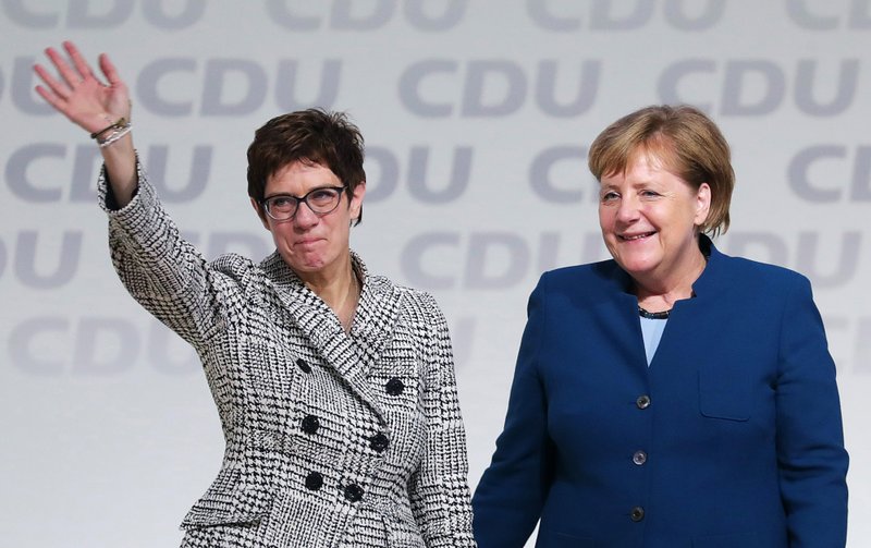 Annegret Kramp-Karrenbauer, left, was elected to succeed German Chancellor Angela Merkel as leader of the Christian Democrat Union on Friday, Dec. 7, 2018.