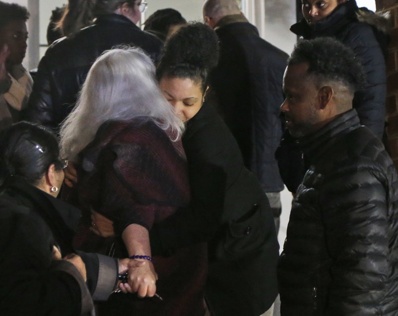 Susan Bro, left, mother of Heather Heyer is hugged by a supporter on the steps of the courthouse after a guilty verdict was reached in the trial of James Alex Fields Jr., Friday, Dec. 7, 2018, at Charlottesville General district court in Charlottesville, Va. Fields was convicted of first degree murder in the death of Heather Heyer as well as nine other counts during a &quot;Unite the Right&quot; rally in Charlottesville . (AP Photo/Steve Helber)