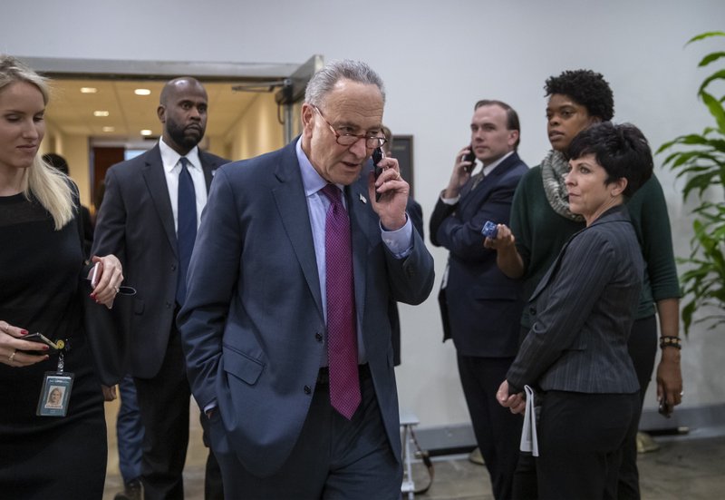 Senate Minority Leader Chuck Schumer, D-N.Y., leaves a closed-door security briefing by CIA Director Gina Haspel on the slaying of Saudi journalist Jamal Khashoggi and the involvement of the Saudi crown prince, Mohammed bin Salman, at the Capitol in Washington, Tuesday, Dec. 4, 2018. (AP Photo/J. Scott Applewhite)