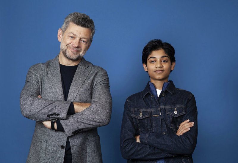 In this Nov. 28, 2018 photo, Andy Serkis, left, and Rohan Chand pose for a portrait at the Four Seasons Hotel in Los Angeles to promote their film "Mowgli: Legend of the Jungle," streaming on Nextflix on Friday, Dec. 7. (Photo by Rebecca Cabage/Invision/AP)