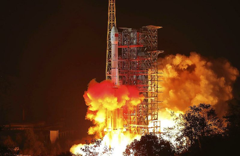 A Chinese rocket takes off from the Xichang launch center in Sichuan province on Saturday, carrying the Chang’e 4 lunar probe. 