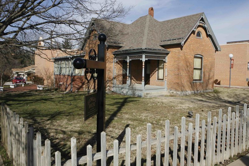 File Photo Built in 1895 by the Matthew brothers for the Oakley family, in 1900 this house at 322 S. Second St. in Rogers was sold to Francis Cunningham Hawkins, who ran a livery stable on South First Street. Three generations of the Hawkins family lived there until shortly before the house became home to the Rogers Historical Museum in 1982.