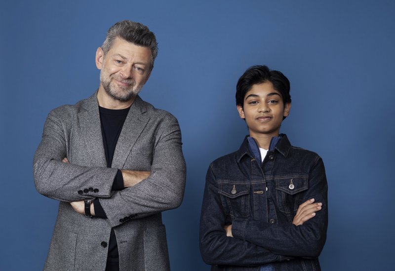 In this Nov. 28, 2018 photo, Andy Serkis, left, and Rohan Chand pose for a portrait at the Four Seasons Hotel in Los Angeles to promote their film &quot;Mowgli: Legend of the Jungle,&quot; streaming on Nextflix on Friday, Dec. 7. (Photo by Rebecca Cabage/Invision/AP)