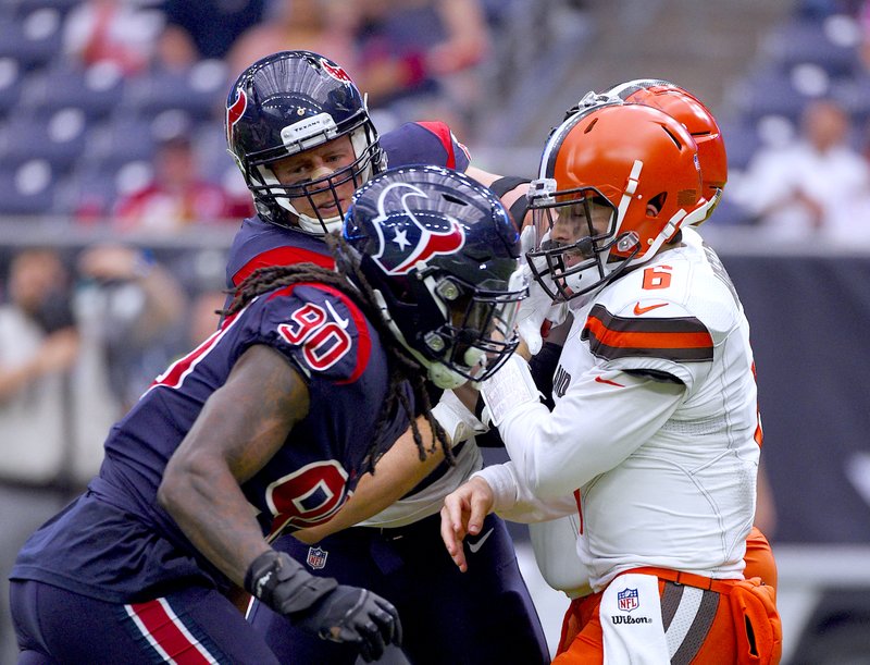 The Associated Press HOME-FIELD ADVANTAGE: Texans defensive end J.J. Watt, back, and defensive Jadeveon Clowney (90) pressure Cleveland quarterback Baker Mayfield (6) a week ago during the second half of a 29-13 win over the Browns in Houston.
