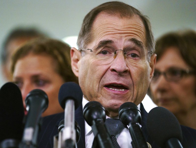 FILE - In this Sept. 28, 2018, file photo, House Judiciary Committee ranking member Jerry Nadler, D-N.Y., talks to media during a Senate Judiciary Committee hearing on Capitol Hill in Washington. Nadler, the top Democrat on the House Judiciary Committee says he believes it would be an "impeachable offense" if it's proven that President Donald Trump directed illegal hush-money payments to women during the 2016 campaign. But Nadler, who's expected to chair the panel in January, says it remains to be seen whether that crime alone would justify Congress launching impeachment proceedings. (AP Photo/Carolyn Kaster, File)