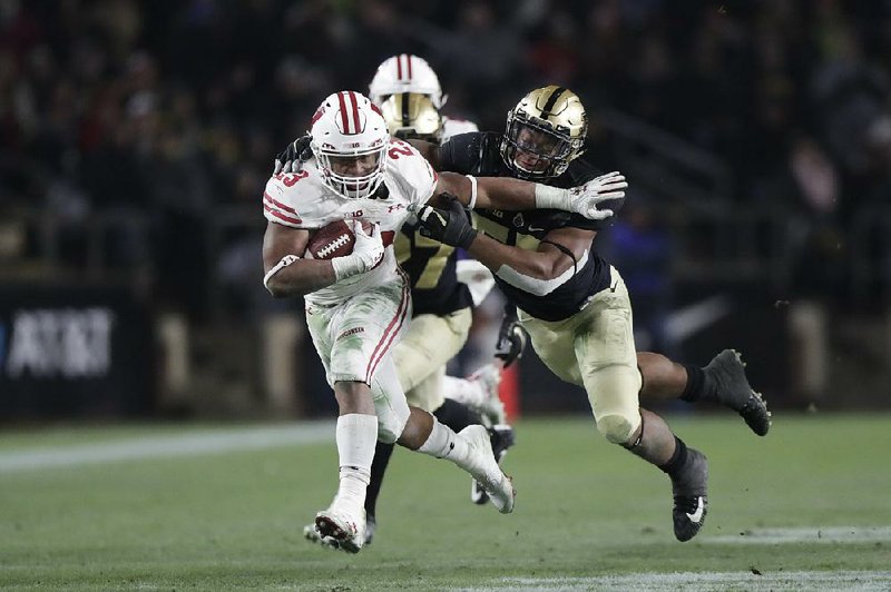 Wisconsin running back Jonathan Taylor (23) has rushed for 3,966 yards in his first two seasons with the Badgers. He’ll enter 2019 as a strong Heisman Trophy candidate.