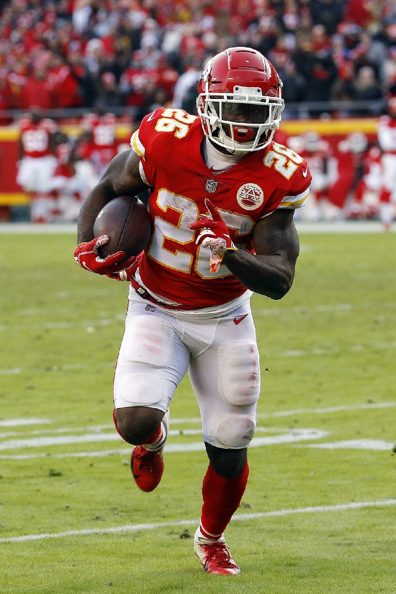 Kansas City running back Damien Williams (26) scored two touchdowns in the Chiefs’ 27-24 overtime victory over the Baltimore Ravens on Sunday.