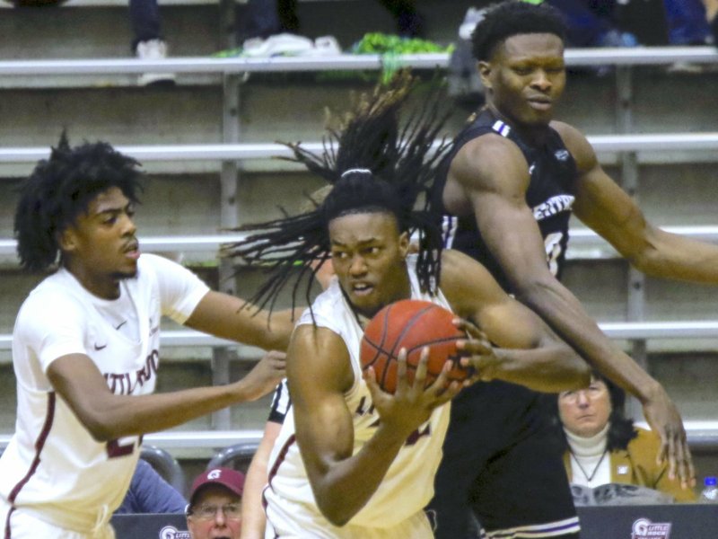 Arkansas Democrat-Gazette/MITCHELL PE MASILUN -- 12/8/2018 --
UALR forward Kris Bankston (32) comes up with the rebound during their game against UCA at the Jack Stephens Center Saturday, Dec 8, 2018, in Little Rock.