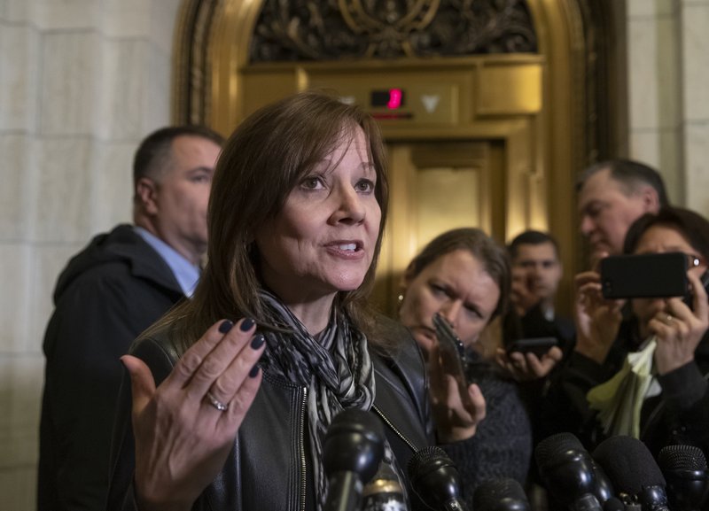 General Motors CEO Mary Barra speaks to reporters after a meeting with Sen. Sherrod Brown, D-Ohio, and Sen. Rob Portman, R-Ohio, to discuss GM's announcement it would stop making the Chevy Cruze at its Lordstown, Ohio, plant, part of a massive restructuring for the Detroit-based automaker, on Capitol Hill in Washington, Wednesday, Dec. 5, 2018. General Motors is fighting to retain a valuable tax credit for electric vehicles as the nation's largest automaker grapples with the political fallout triggered by its plans to shutter several U.S. factories and shed thousands of workers. (AP Photo/J. Scott Applewhite)