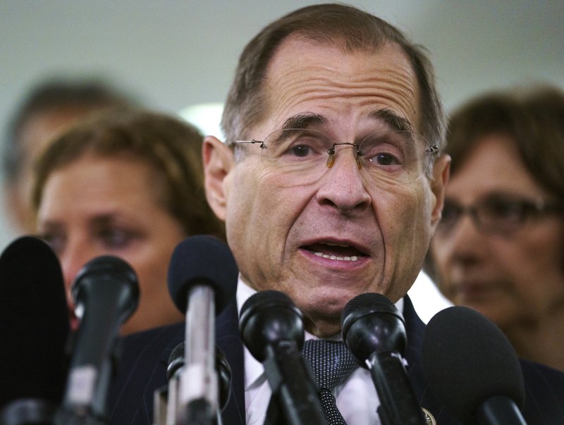 FILE - In this Sept. 28, 2018, file photo, House Judiciary Committee ranking member Jerry Nadler, D-N.Y., talks to media during a Senate Judiciary Committee hearing on Capitol Hill in Washington. Nadler, the top Democrat on the House Judiciary Committee says he believes it would be an &quot;impeachable offense&quot; if it's proven that President Donald Trump directed illegal hush-money payments to women during the 2016 campaign. But Nadler, who&#x2019;s expected to chair the panel in January, says it remains to be seen whether that crime alone would justify Congress launching impeachment proceedings. (AP Photo/Carolyn Kaster, File)