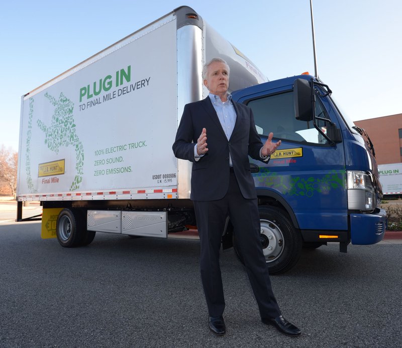 Craig Harper, chief operations officer an executive vice president of JB Hunt Transport, speaks Wednesday, Dec. 5, 2018, about one of five all-electric FUSO eCanter box trucks that are joining the company fleet for local deliveries. The emissions-free, silent trucks operate using rechargeable lithium-ion batteries.