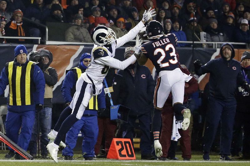 Chicago Bears cornerback Kyle Fuller (23) intercepts a pass intended for Los Angeles Rams wide receiver Josh Reynolds (83) during the second half Sunday in Chicago. With three games to go, the Bears (9-4) are closing in on their first postseason appearance since the 2010 team won the NFC North.