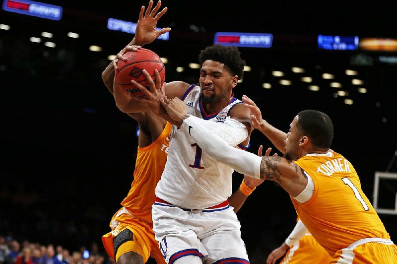 Dedric Lawson (1) is averaging 19.1 points this season to help lead the Kansas Jayhawks (8-0) to the top spot in The Associated Press men’s poll.