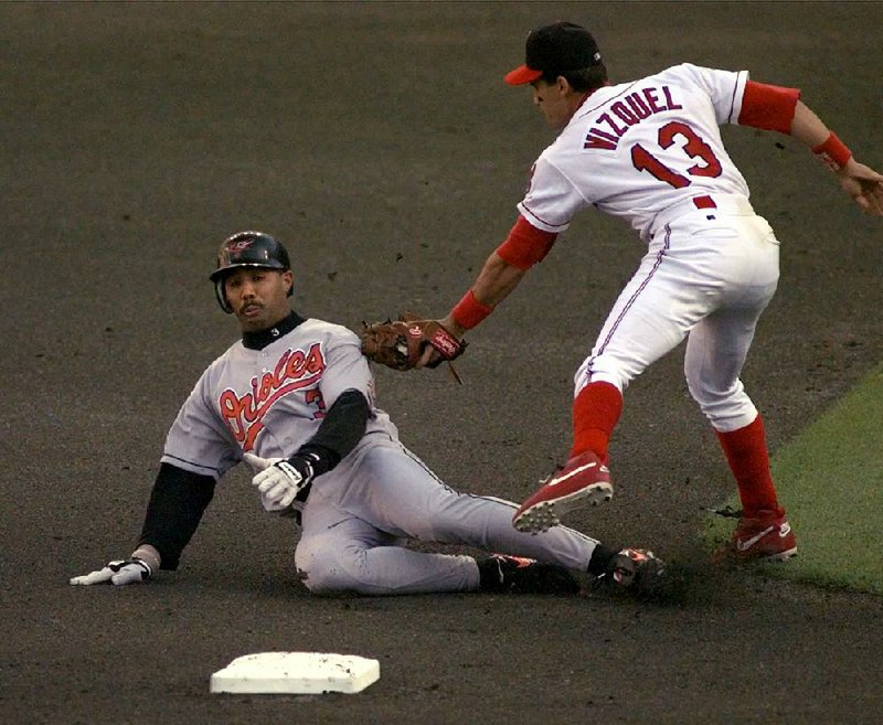 Harold Baines, playing for the Baltimore Orioles in 1997, is tagged out at second base by Cleveland Indians shortstop Omar Vizquel during the American League Championship Series. Baines was elected into the Baseball Hall of Fame on Sunday by the Today’s Game Era Committee despite never receiving more than 6.1 percent of the vote from the Baseball Writers’ Association when he was on the ballot.
