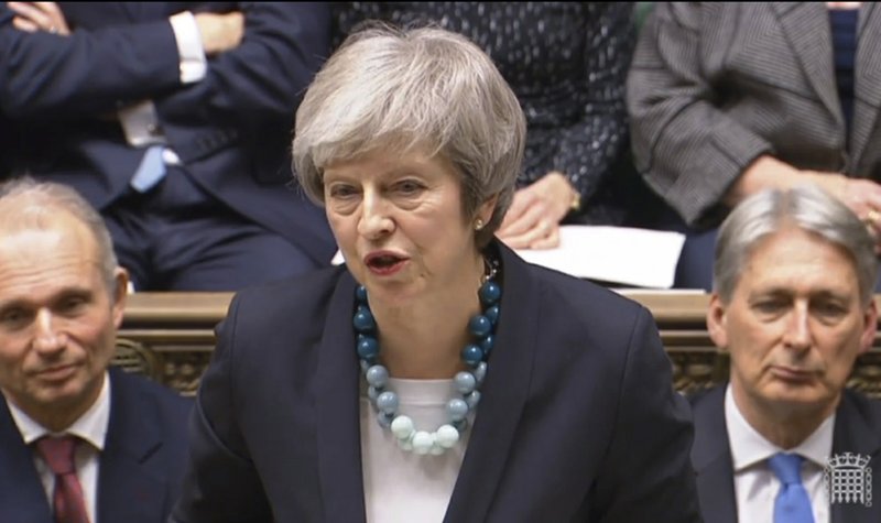 In this grab taken from video, Britain's Prime Minister Theresa May makes a statement in the House of Commons, in London, Monday, Dec. 10, 2018. May has postponed Parliament's vote on her European Union divorce deal to avoid a shattering defeat _ a decision that throws her Brexit plans into chaos. (PA via AP)