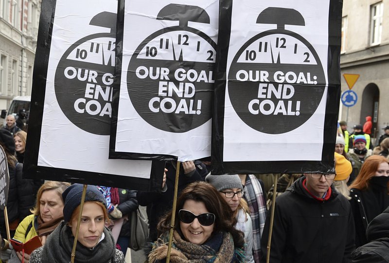 Climate activists attend the March for Climate in a protest against global warming in Katowice, Poland, Saturday, Dec. 8, 2018, as the COP24 UN Climate Change Conference takes place in the city. (AP Photo/Alik Keplicz)