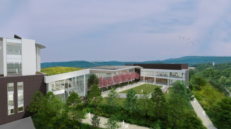 Courtesy/FAYETTEVILLE PUBLIC LIBRARY A artist's rendering depicts a view of the proposed expansion of the Fayetteville Public Library looking southeast.