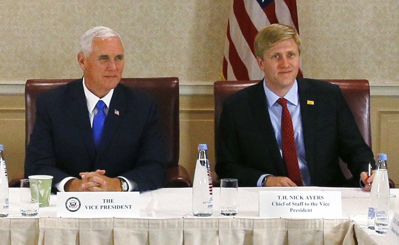 FILE - In this Aug. 1, 2017 file photo, Vice President Mike Pence, left, attends a meeting with Georgia opposition leaders in Tbilisi, Georgia. Chief of Staff to the Vice President, Nick Ayers, is right. Ayers, President Donald Trump's top pick to replace John Kelly as chief of staff, is no longer expected to fill that role, according to a White House official. The official says that Trump and Ayers could not agree on Ayers' length of service. (Zurab Kurtsikidze/Pool Photo via AP, File)