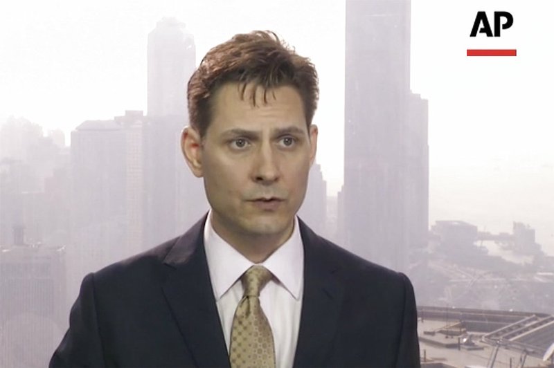 In this image made from a video taken on March 28, 2018, North East Asia senior adviser Michael Kovrig speaks during an interview in Hong Kong. A former Canadian diplomat reportedly has been arrested in China. The International Crisis Group said Tuesday, Dec. 11 it's aware of reports that its North East Asia senior adviser Michael Kovrig has been detained. (AP Photo)