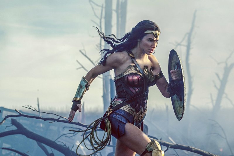 This image released by Warner Bros. Entertainment shows Gal Gadot in a scene from "Wonder Woman." A new study organized by Time's Up, the Hollywood-based organization formed to promote gender equality, finds that female-led films outperform male-led movies at the box office. The study analyzed the 350 top-grossing films worldwide released between January 2014 and December 2017. It found that in films with small, medium and large budgets, all averaged better global grosses when a woman was listed as the lead star. (Clay Enos/Warner Bros. Entertainment via AP)