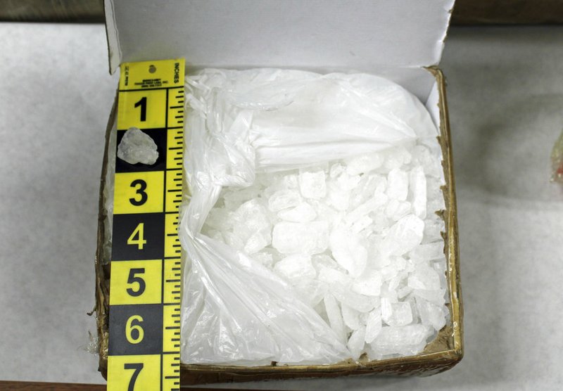FILE - This 2018 photo provided by the Cannon River Drug and Violent Task Force shows a box containing methamphetamine. Authorities said Friday, Sept. 14, 2018 that task force agents assisted by a Minneapolis police SWAT team seized just under 171 pounds of meth with an estimated street value of $7.75 million. On Wednesday, Dec. 12, 2018, the Centers for Disease Control and Prevention reported the number of fatal overdoses involving meth more than tripled between 2011 and 2016 in the U.S. The percentage of overdose deaths involving meth grew from less than 5 percent to nearly 11 percent. (Cannon River Drug and Violent Task Force via AP)