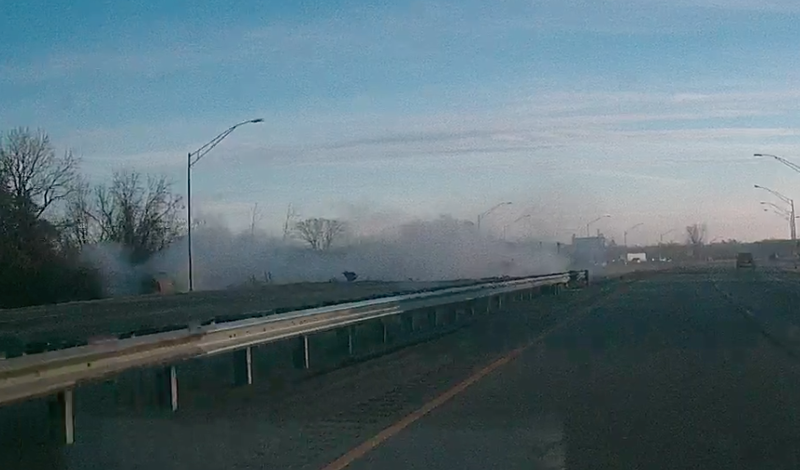 This still from dash-cam video provided by William Crowden with Protech Security and W&R Appliance Pickup Service shows the aftermath of a crash on Interstate 540 that killed 3 people on Monday morning.
