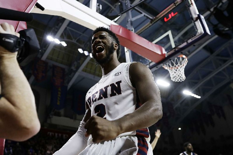 Antonio Woods (shown) and AJ Brodeur scored 16 points each Tuesday to lead Pennsylvania to a 78-75 victory over No. 17 Villanova at the Palestra in Philadelphia. It was the Quakers’ first victory over the Wildcats since 2002. 