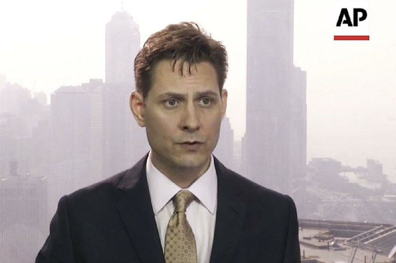 In this image made from a video taken on March 28, 2018, Michael Kovrig, an adviser with the International Crisis Group, a Brussels-based non-governmental organization, speaks during an interview in Hong Kong. Canadian Public Safety Minister Ralph Goodale confirmed on Tuesday, Dec. 11, 2018, that Kovrig, a former Canadian diplomat, was arrested Monday night in Beijing, China. 