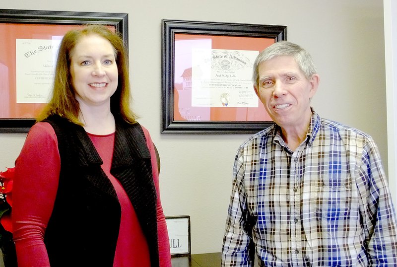 Lynn Atkins/The Weekly Vista Paul Byrd and Melissa Massey will both have their names on the door at a local accounting firm.