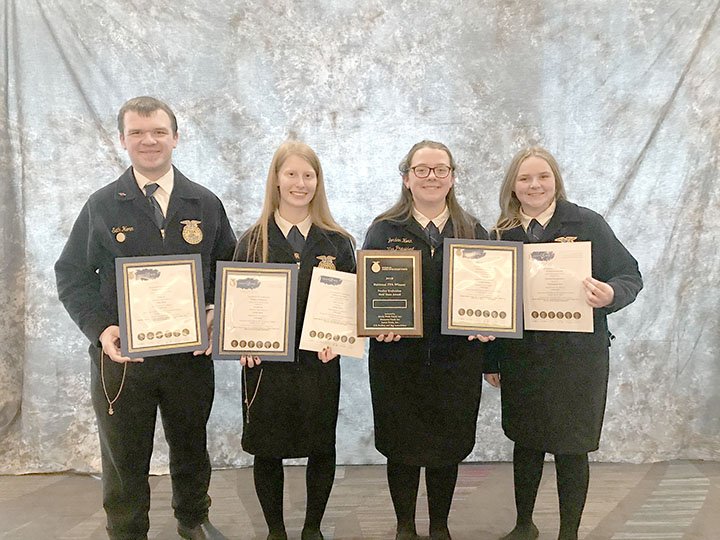 COURTESY PHOTO Farmington FFA's Poultry Judging Team came in second place at the national contest in October in Indianapolis, Ind. Team members are Seth Horn, left, Emily Spatz, Jordan Horn and Katelynn Horn.