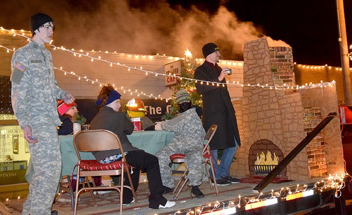 Westside Eagle Observer/MIKE ECKELS The first-place winner in the Decatur Christmas Parade went to First Baptist Church of Decatur for its best use of the parade theme, "I'll Be Home for Christmas." The float was part of the 2018 Decatur Christmas Parade, which made its way through downtown Decatur Dec. 7.