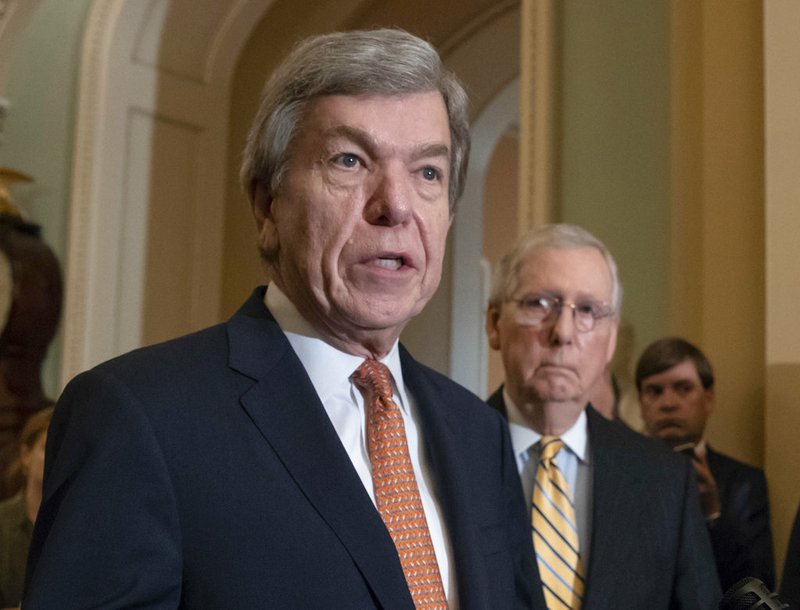 In this Aug. 21, 2018, file photo, Sen. Roy Blunt, R-Mo., speaks as Senate Majority Leader Mitch McConnell, R-Ky., listens at the Capitol in Washington. House and Senate negotiators have reached an agreement on a bill to overhaul the process for handling sexual misconduct allegations on Capitol Hill. The push for the legislation took on new urgency in the past year, as more than a half-dozen lawmakers resigned amid allegations of sexual misconduct. (AP Photo/J. Scott Applewhite, File)