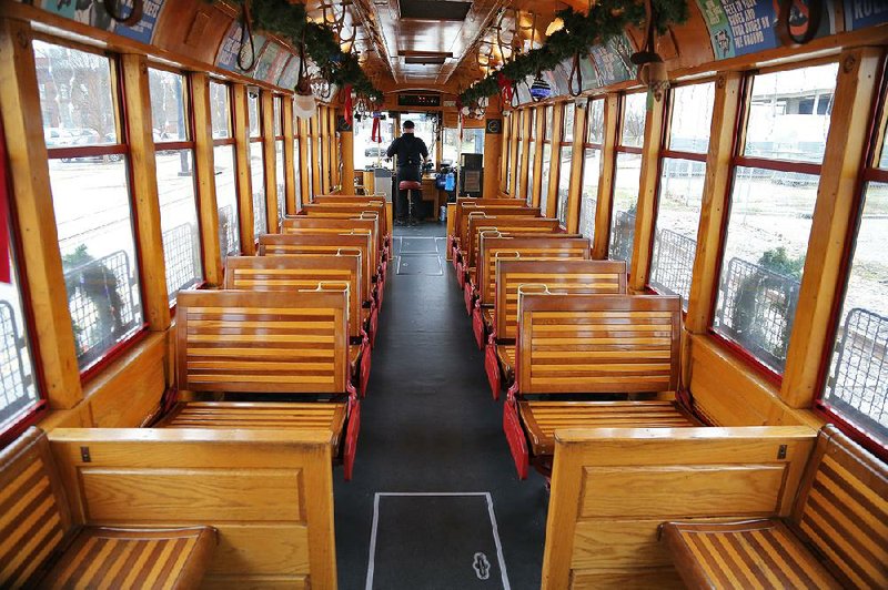 Bobby Ward drives a Rock Region Metro streetcar Wednesday in downtown Little Rock. Streetcar ridership was way down this year. 