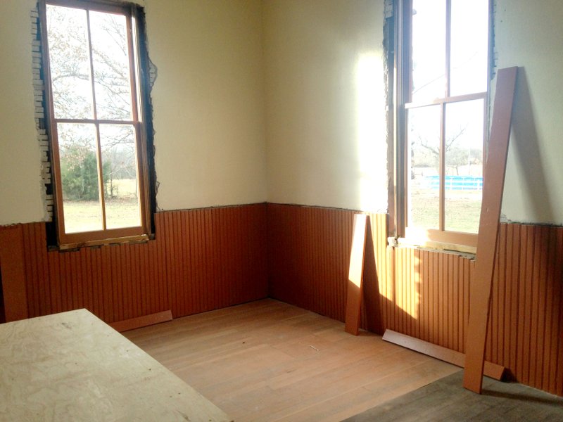 Sally Carroll/McDonald County Press Volunteers of the New Bethel School Preservation Association recently painted the walls, bringing the old schoolhouse a new, fresh look. Renovation work continues on the project.